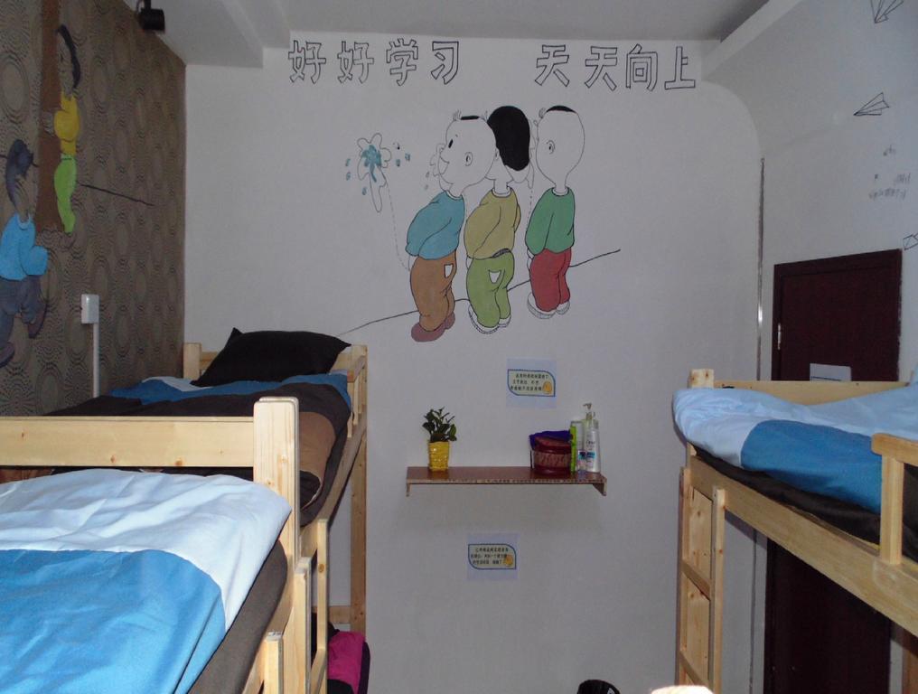 Hua Qiu Ku Youth Hostel East Street Branch Xian Ruang foto